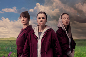 a group of women standing in a field